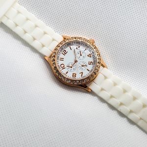 White Wristwatch with Bronze/Gold Accents